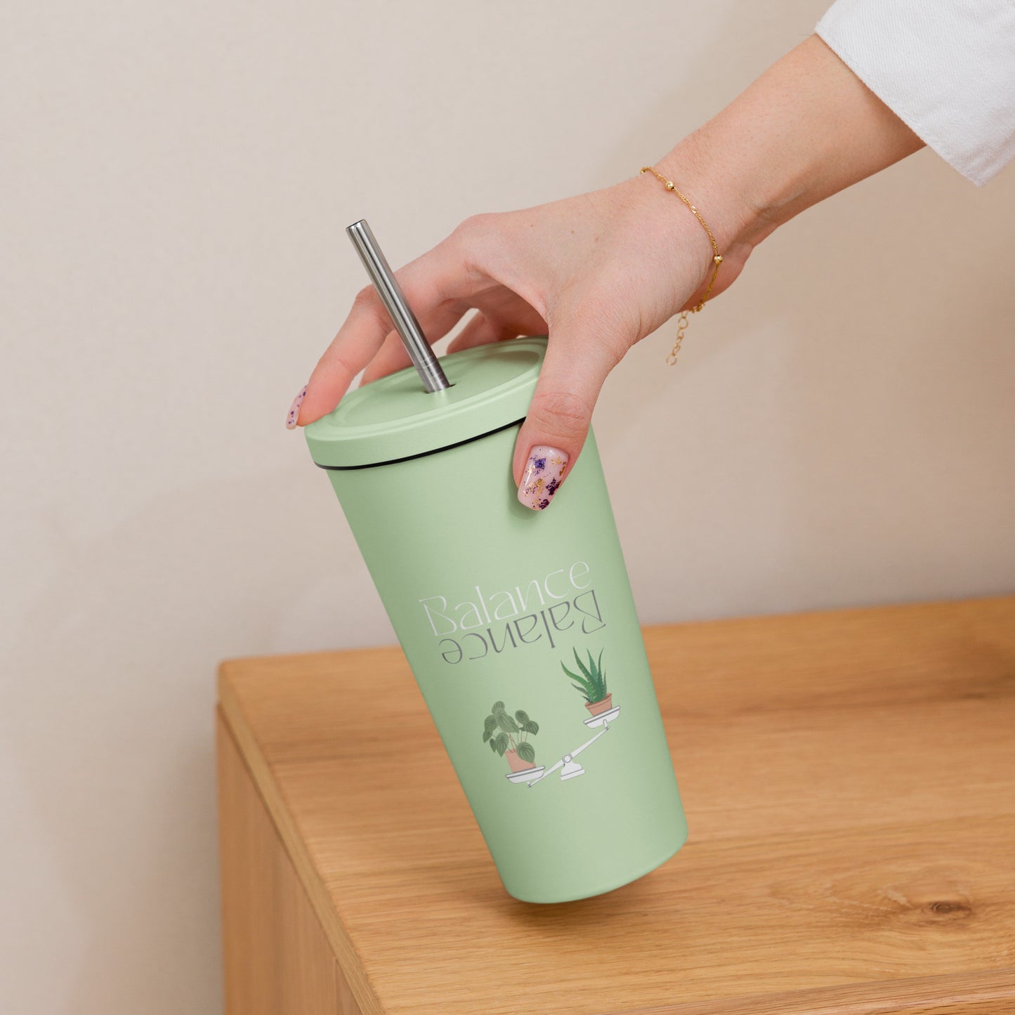 Balance 20oz Insulated tumbler with a straw